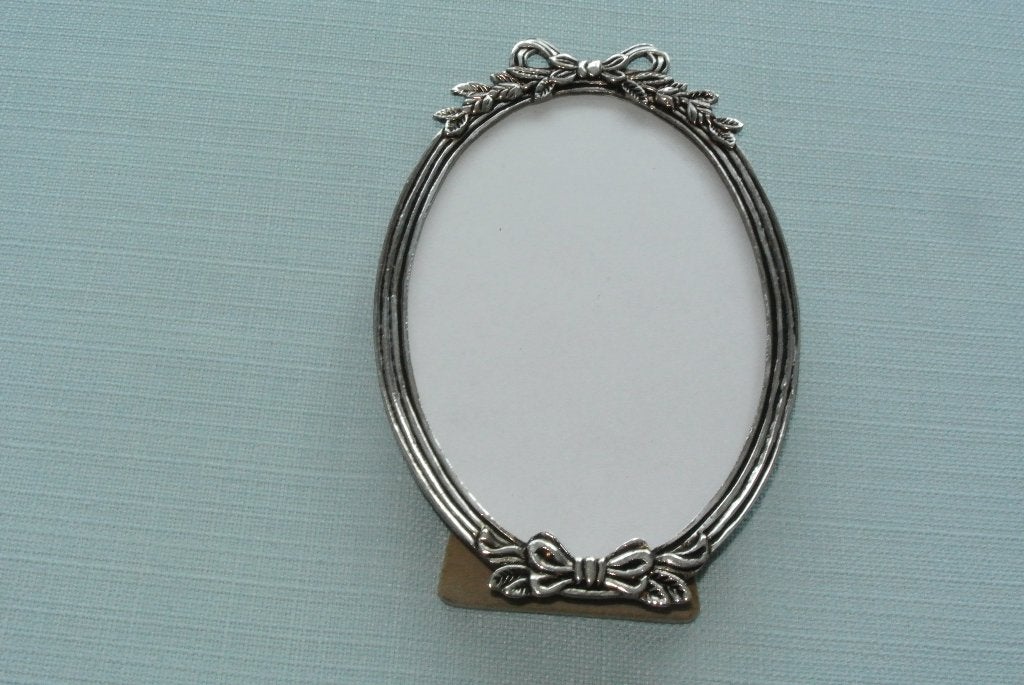 Ovale fotolijst met strik verzilverd / Vintage, Ophalen of Verzenden