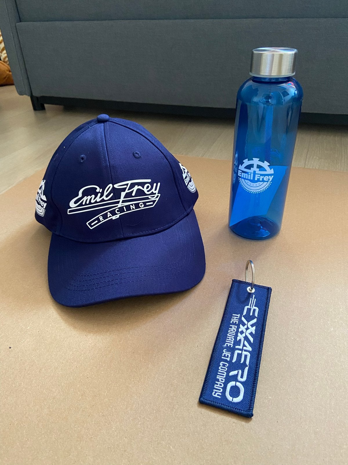 Emily Frey Racing pet, fles en sleutelhanger., Ophalen of Verzenden, Nieuw, Pet