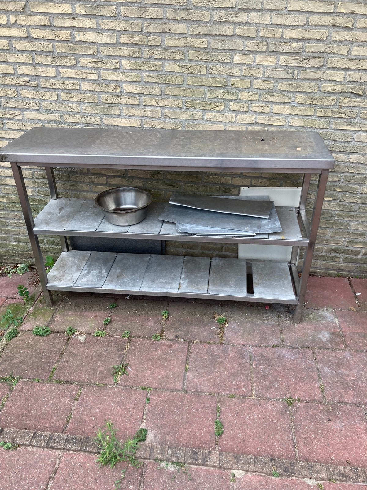 Professionele rvs tafel aangeboden, Ophalen