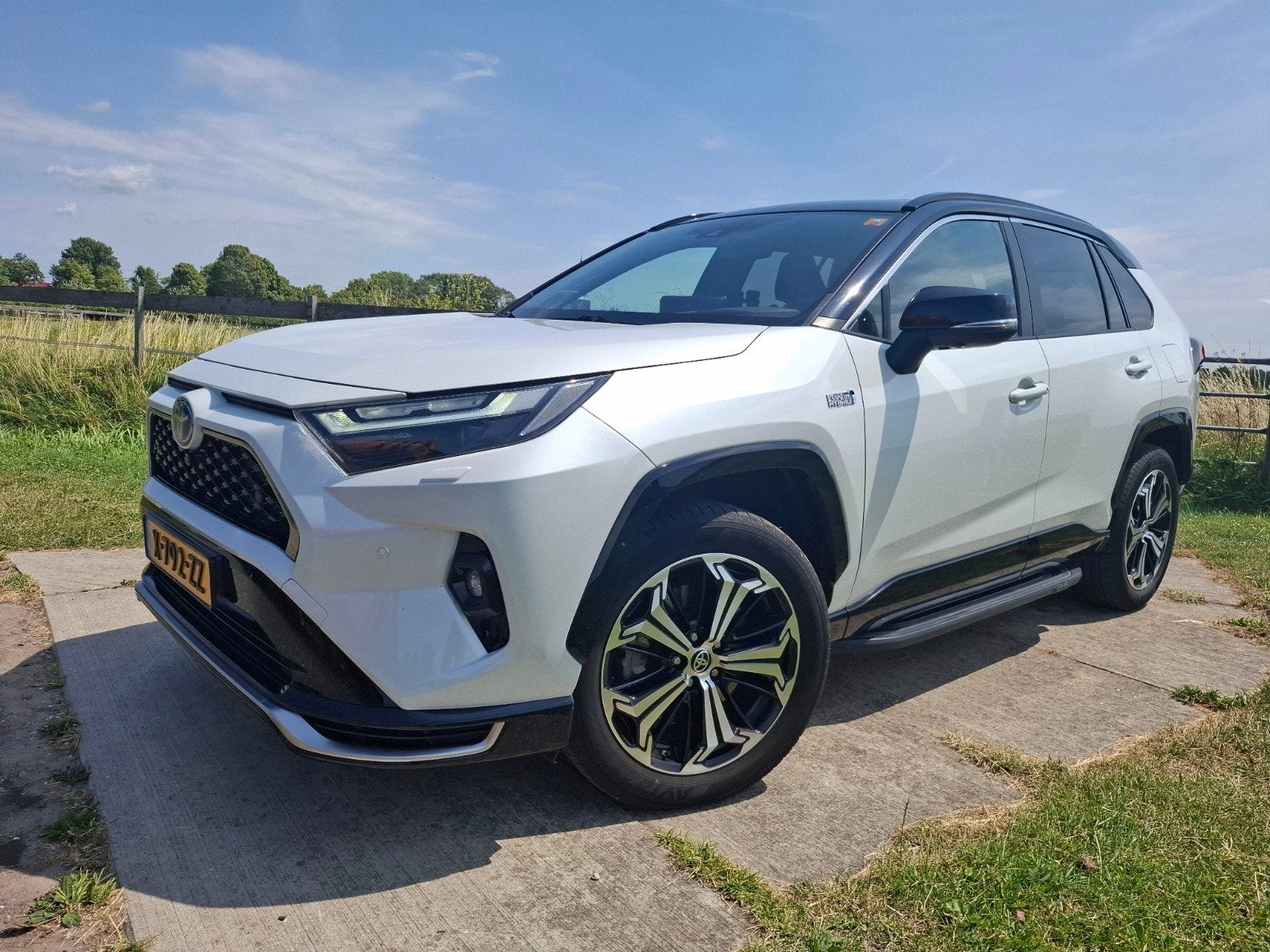 Toyota Rav4 2.5 Plug-in Hybrid 306pk AWD 2023 Style bi-tone, Auto's, Automaat, 4 cilinders, Bedrijf, Vierwielaandrijving