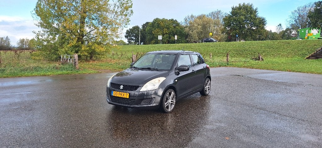 Suzuki Swift 1.2 5-D 2011 Zwart, Auto's, Voorwielaandrijving, Stof, 4 cilinders, 400 kg