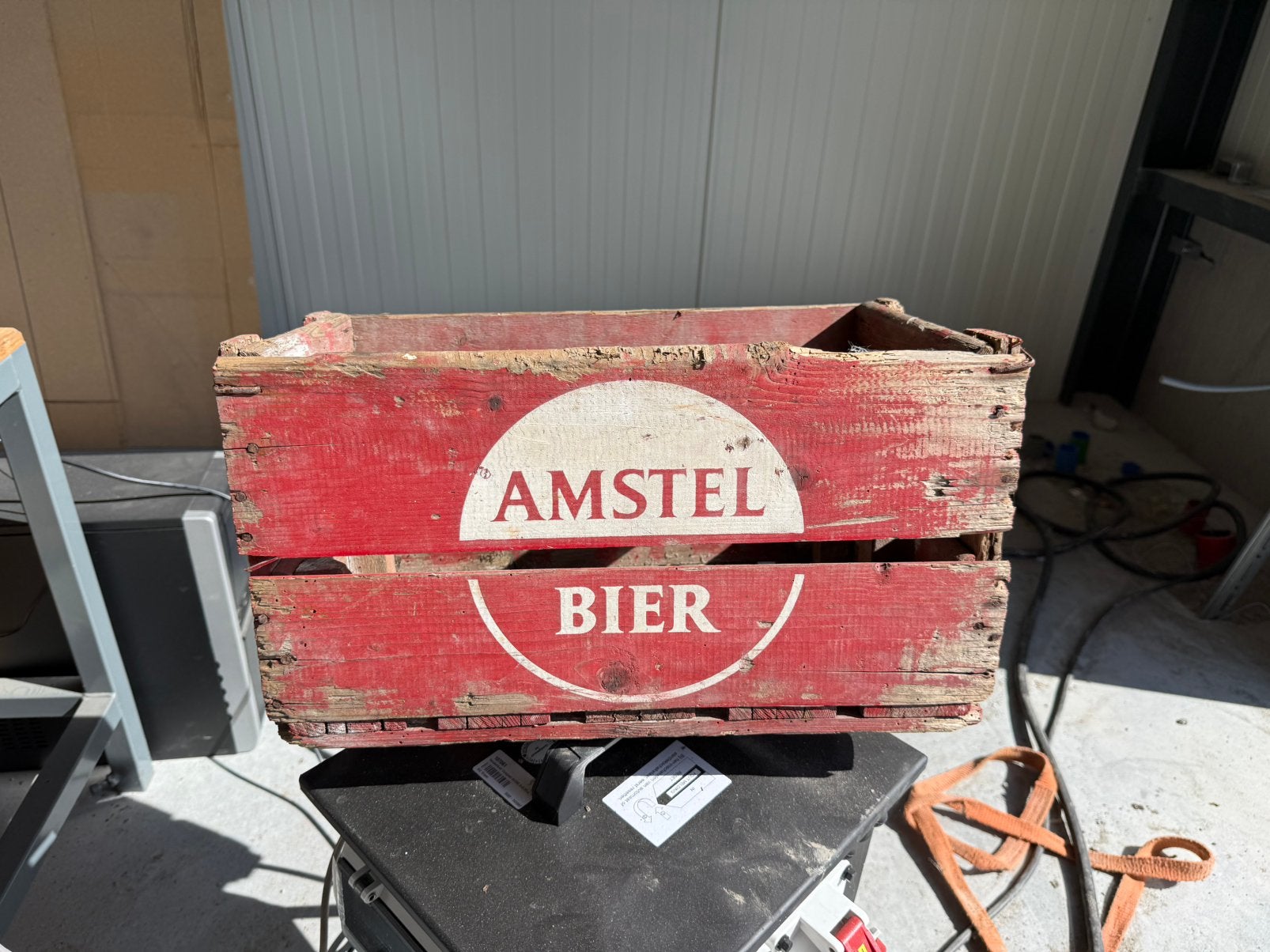 Antieke houten Amstel krat, Ophalen