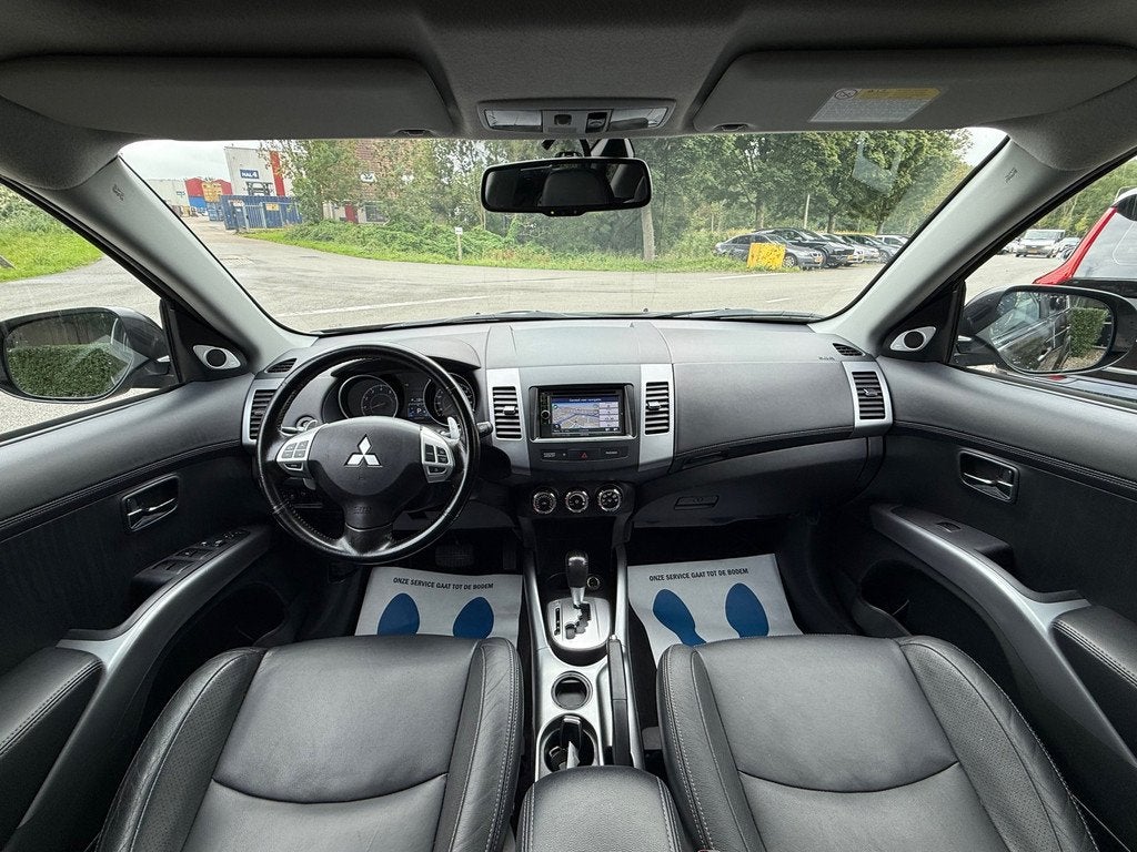 Mitsubishi Outlander 2.0 Edition Two - AUTOMAAT - PANORAMDAK, Auto's, Mitsubishi, Zwart, 4 cilinders, Bruin, Bedrijf