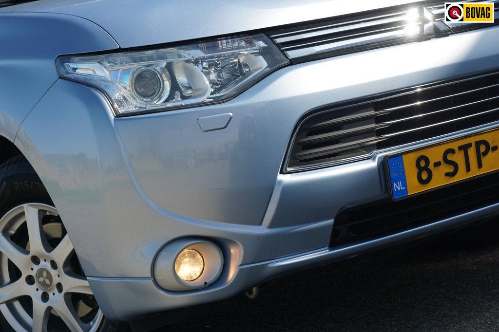 Mitsubishi Outlander 2.0 PHEV Instyle+ | Cool Silver Metalli, Auto's, Mitsubishi, 4 cilinders, Blauw, Leder en Stof, Hybride Elektrisch/Benzine
