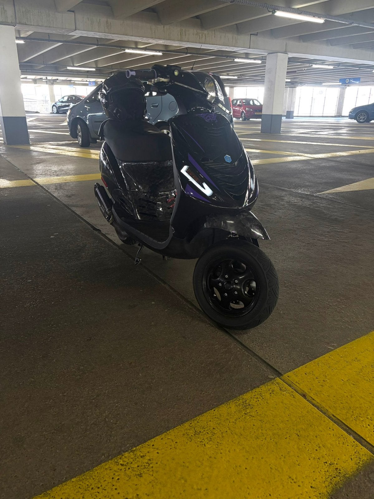 Piaggio zip H2o carbon paars, Ophalen