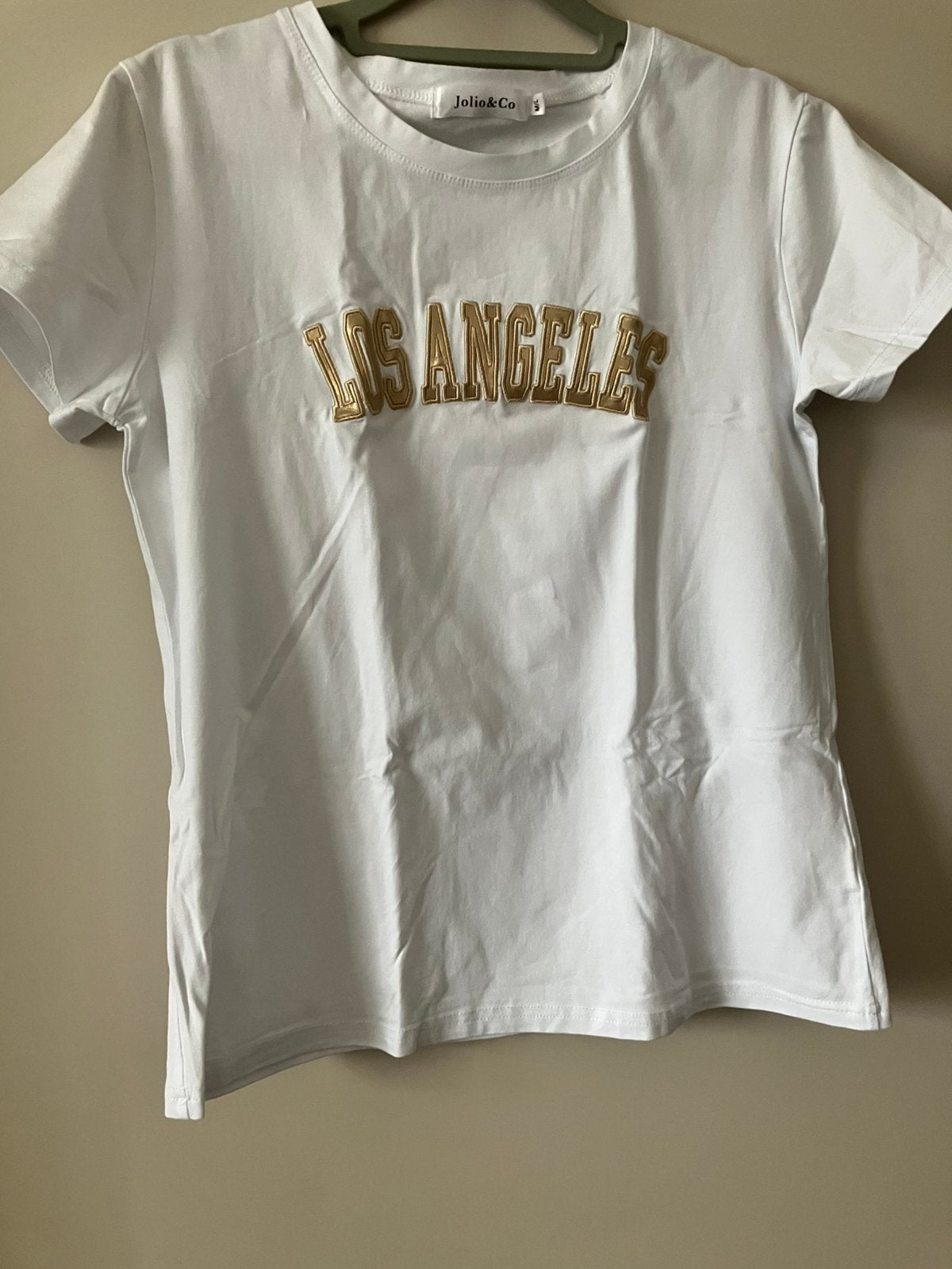 Nieuw/wit t shirt beige tekst/M-Jolio & Co, Kleding | Dames, Maat 38/40 (M), Wit, Nieuw, Ophalen of Verzenden