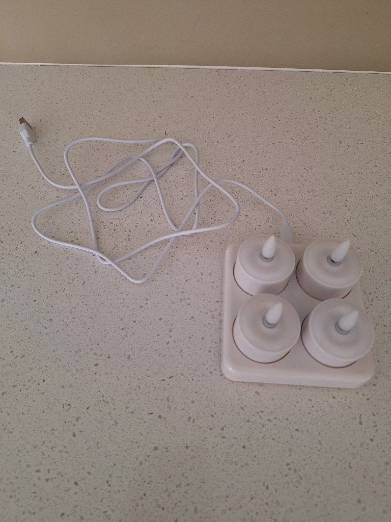 Oplaadbare waxinelichtjes 4 stuks, Ophalen of Verzenden, Zo goed als nieuw, Overige typen