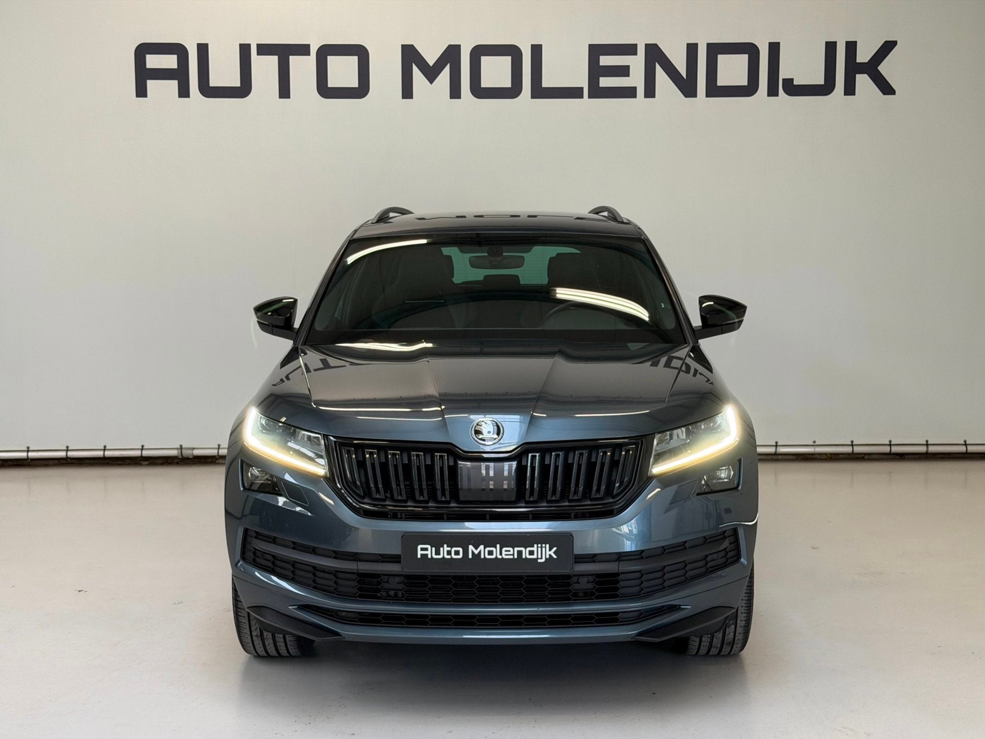 Skoda Kodiaq 1.5 TSI 150 PK DSG Sportline / Camera / Trekhaa, Auto's, Zwart, 4 cilinders, 150 pk, Origineel Nederlands