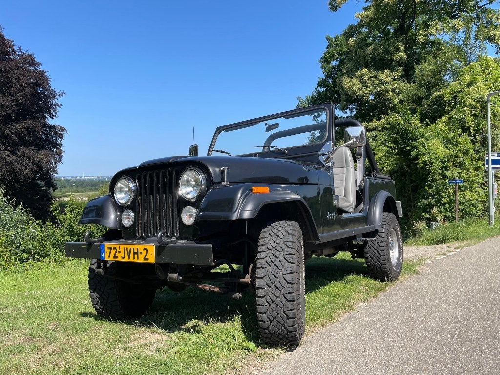 Jeep CJ 7 zwart , 4X4 , belasting vrij, Auto's, 4200 cc, Leder en Stof, Zwart, Bedrijf