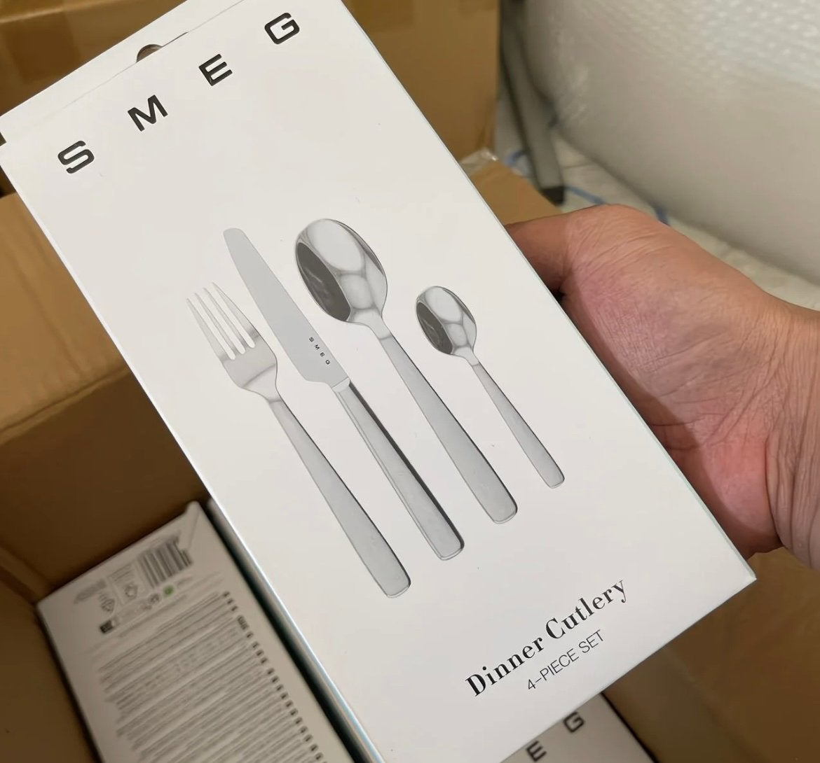 SMEG Cutlery Set (4-piece) - Brand New in Box, Nieuw, Ophalen of Verzenden, Rvs of Chroom, Vaatwasserbestendig