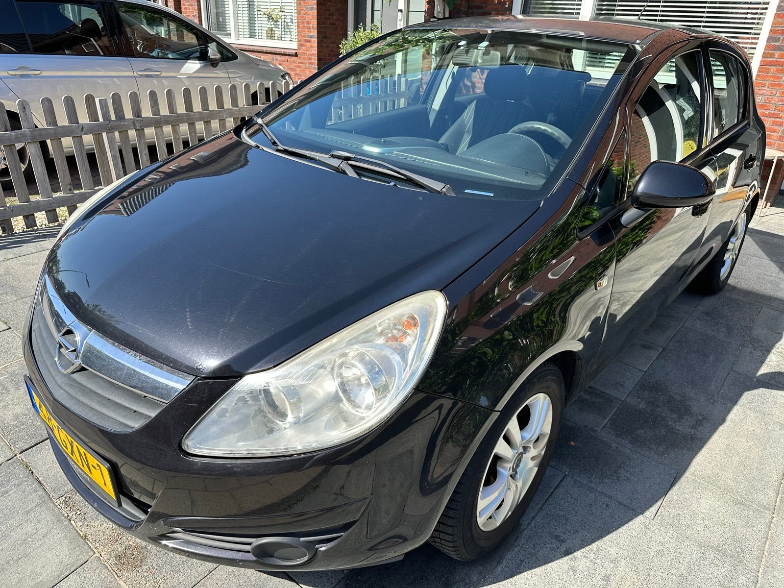 Opel Corsa 1.2 2008 NAP | AIRCO | APK | CRUISE | 5DEURS, Auto's, Voorwielaandrijving, Stof, Zwart, 4 cilinders