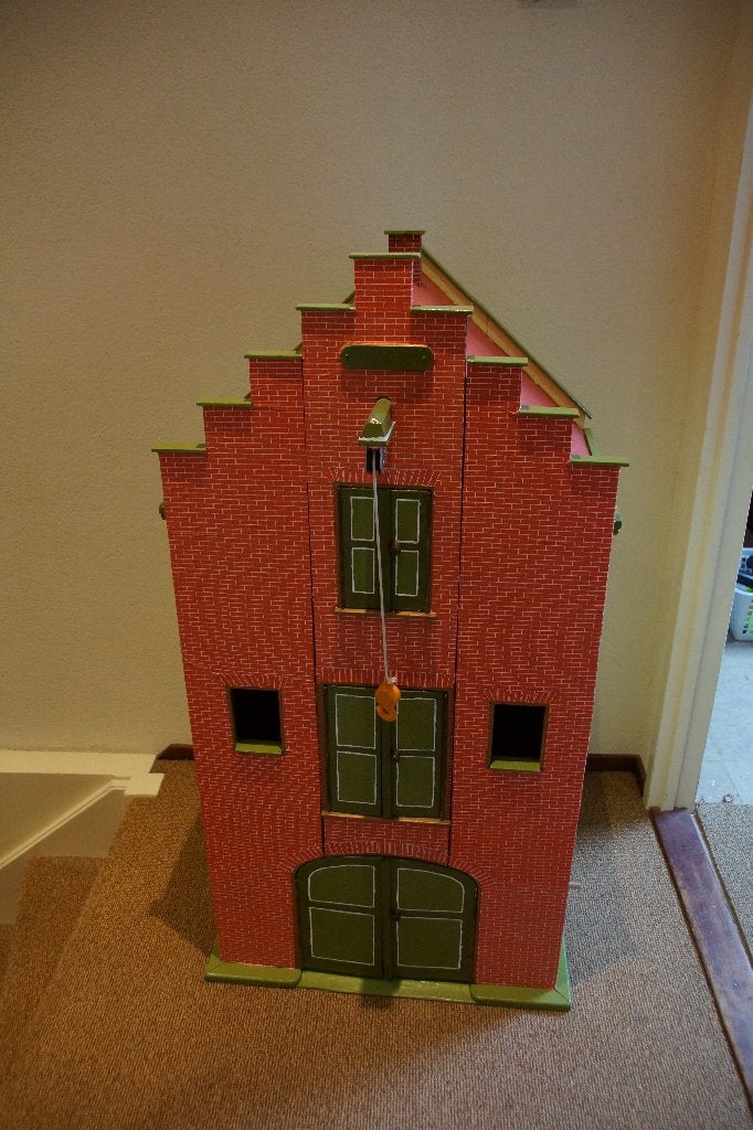 Houten pakhuis (grachtenpand), Ophalen