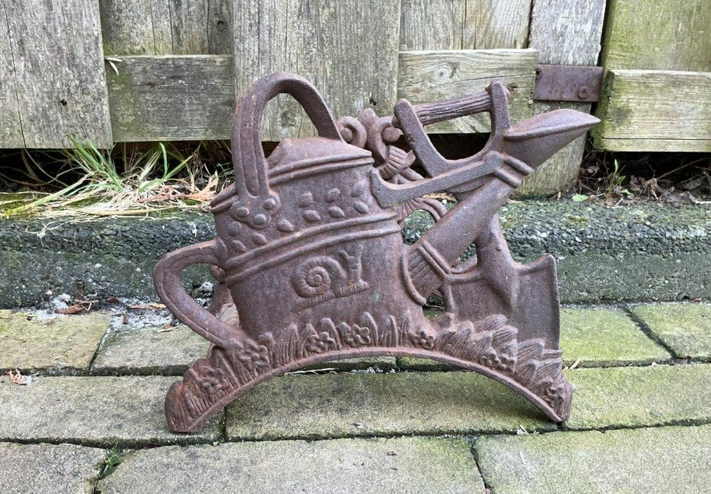 Brocante gietijzeren tuinslang houder, Ophalen