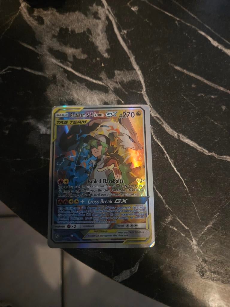 Pokémon Kaart Reshiram & Zekrom GX TAG TEAM, Ophalen of Verzenden, Zo goed als nieuw, Losse kaart, Foil