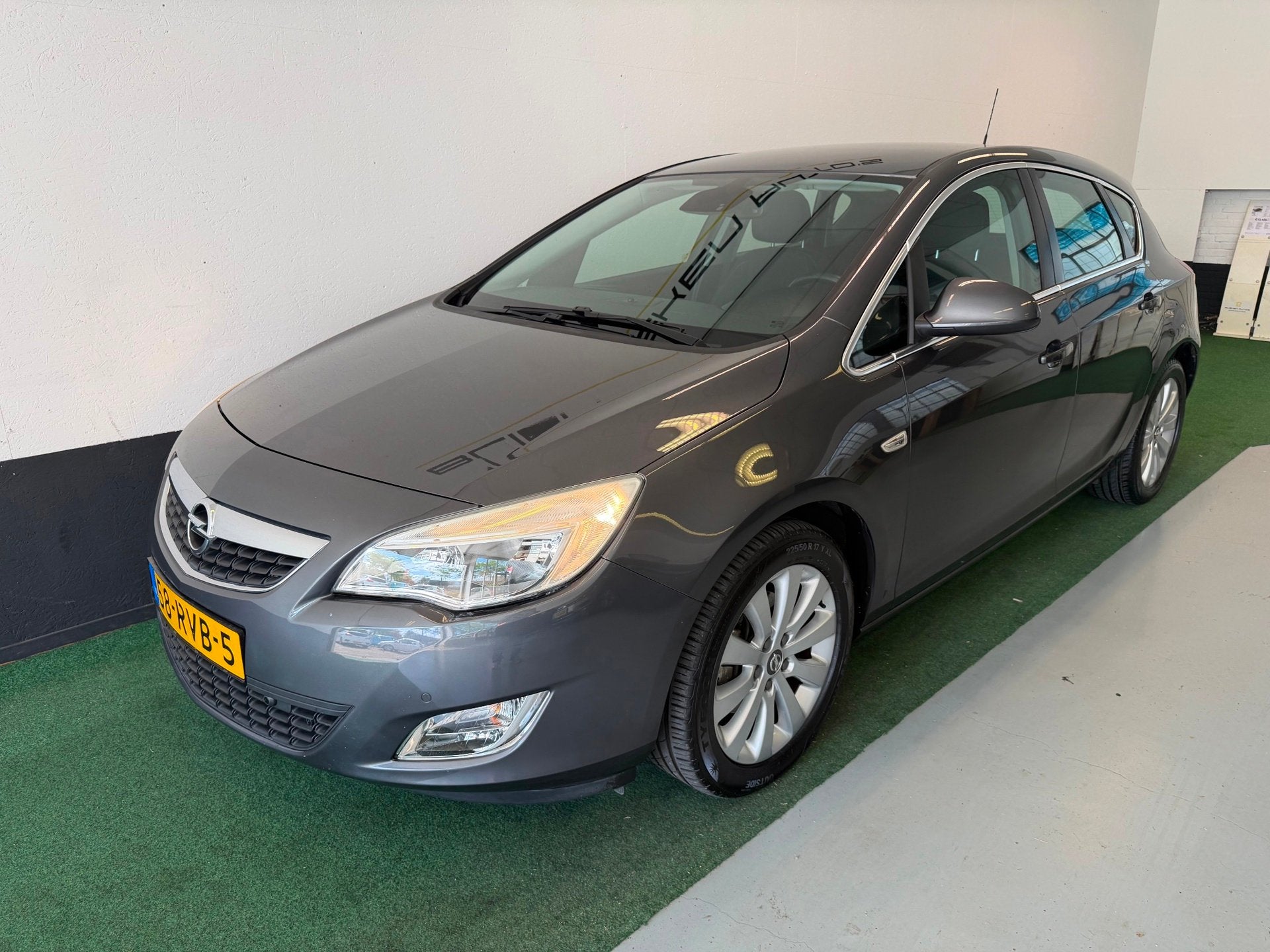 Opel Astra 1.6 Turbo Cosmo *zie tekst*, Auto's, Euro 5, 730 kg, Gebruikt, 4 cilinders