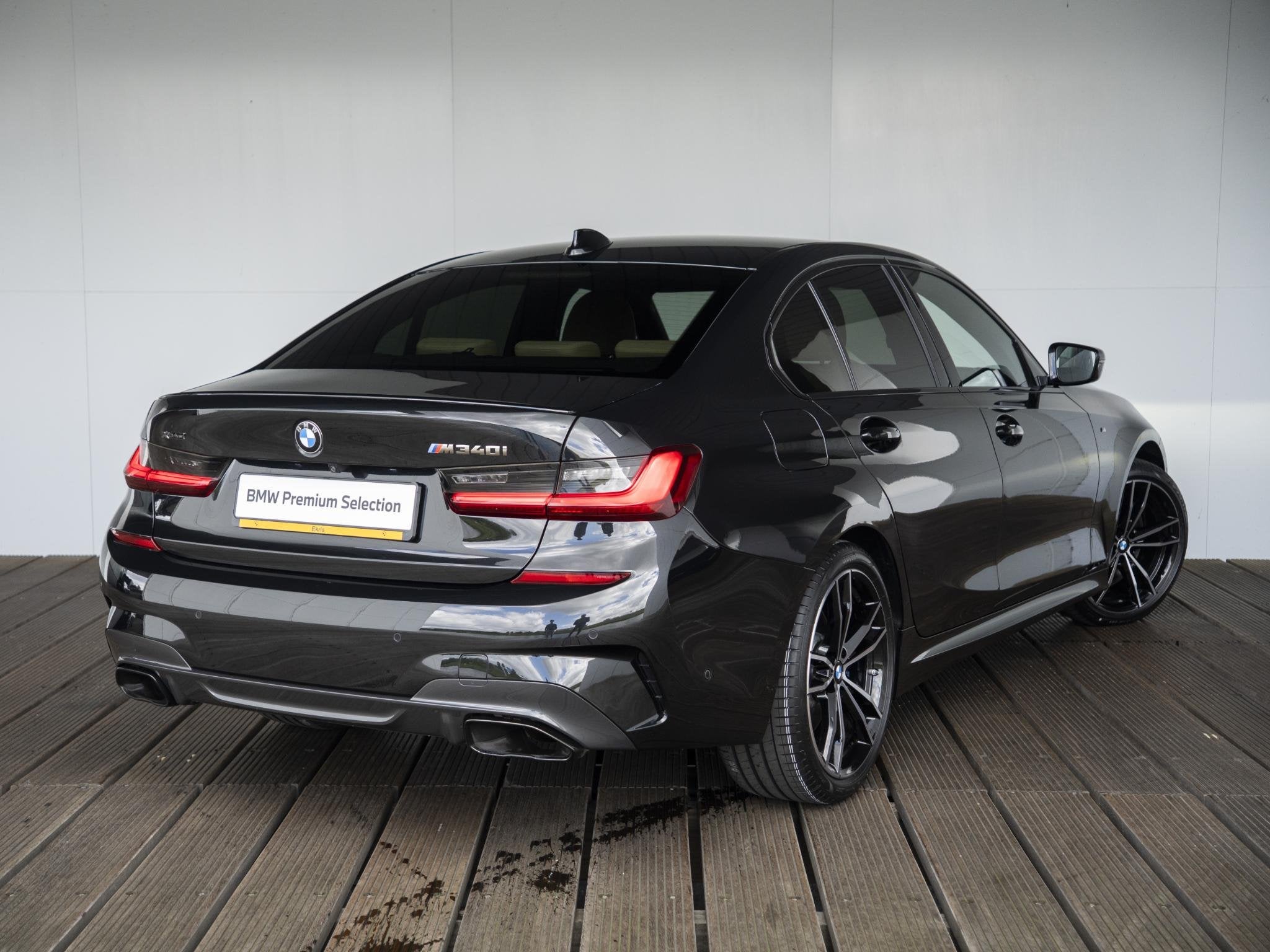 BMW 3 Serie Sedan M340i xDrive | Innovationspakket | Comfort, Auto's, BMW, Stof, Met garantie (alle), Zwart, Bedrijf