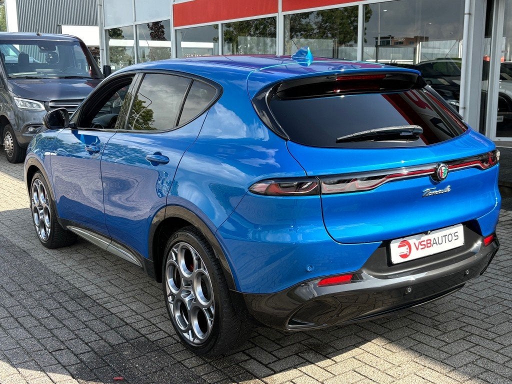 Alfa romeo TONALE 1.5T HYBRID AUT. EDIZIONE SPECIALE LED NAV, Auto's, Gebruikt, Huisgarantie, Met garantie (alle), Blauw