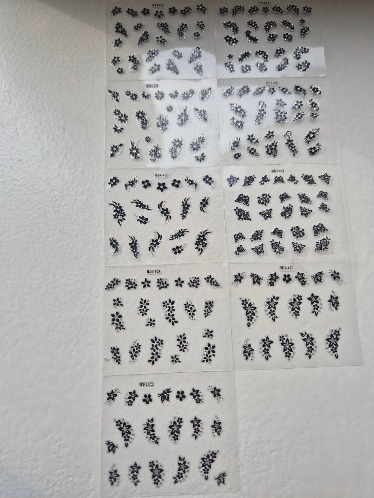 9 vellen nagelstickers: Zwart-witte bloemen & vlinders, Ophalen of Verzenden