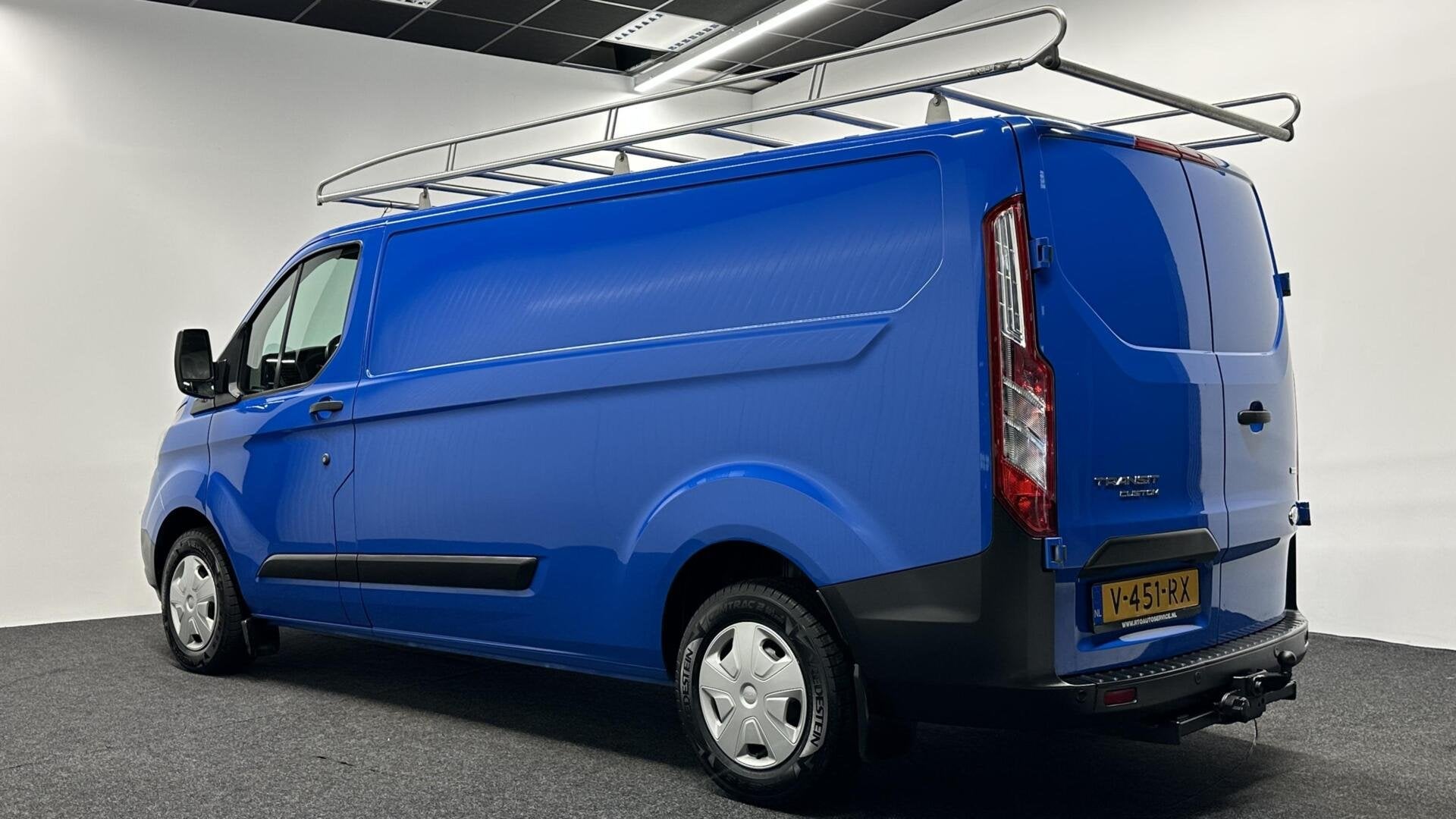 Ford Transit Custom 300 2.0 TDCI L2H1 Ambiente AIRCO TREKHAA, Auto's, Stof, 4 cilinders, Met garantie (alle), Blauw