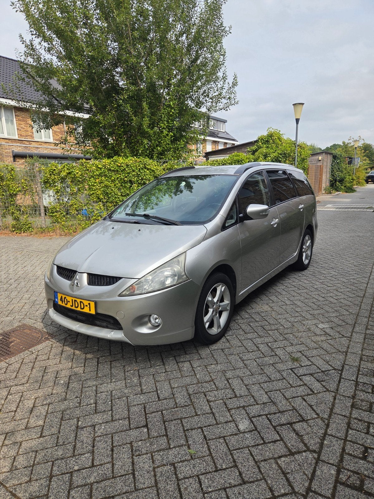 Mitsubishi Grandis 2.4 Mivec 7 2009 Grijs, Auto's, Voorwielaandrijving, Stof, 164 pk, Zwart