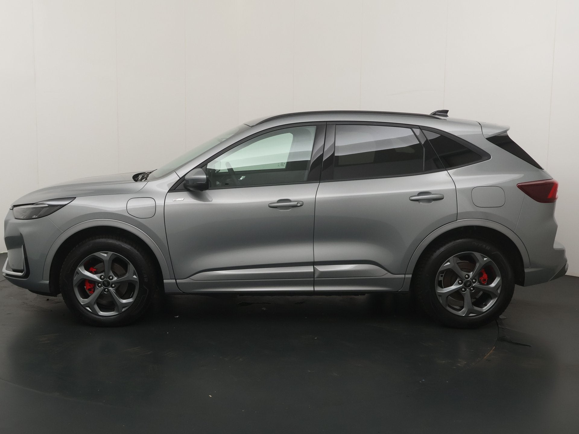 Ford Kuga 2.5 PHEV 243 pk ST-Line X | Trekhaak I AGR stoelen, Dealer onderhouden, 14 kWh, Gebruikt, Zwart