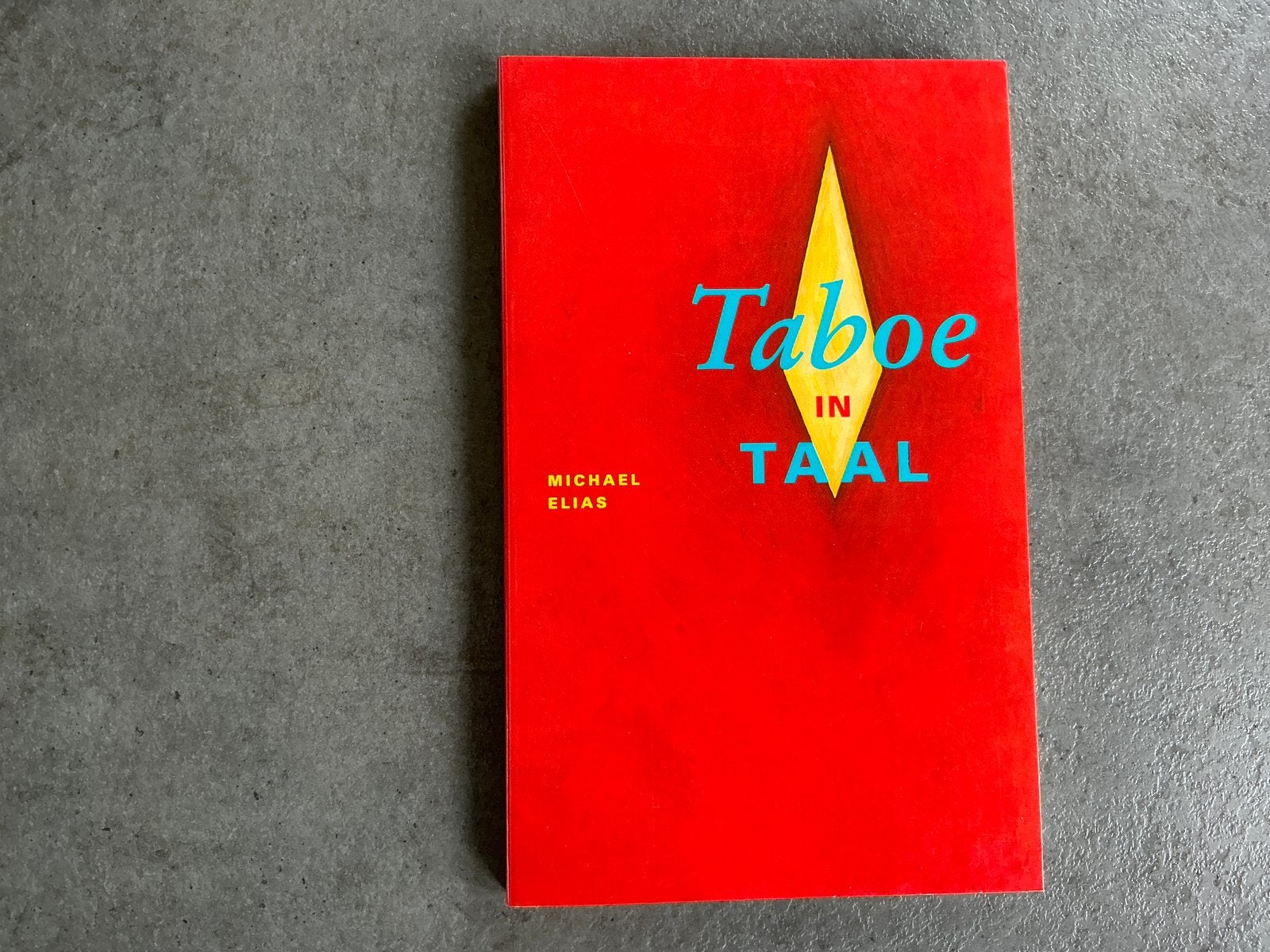 Michael Elias - Taboe in taal (KWF), Ophalen of Verzenden, Zo goed als nieuw
