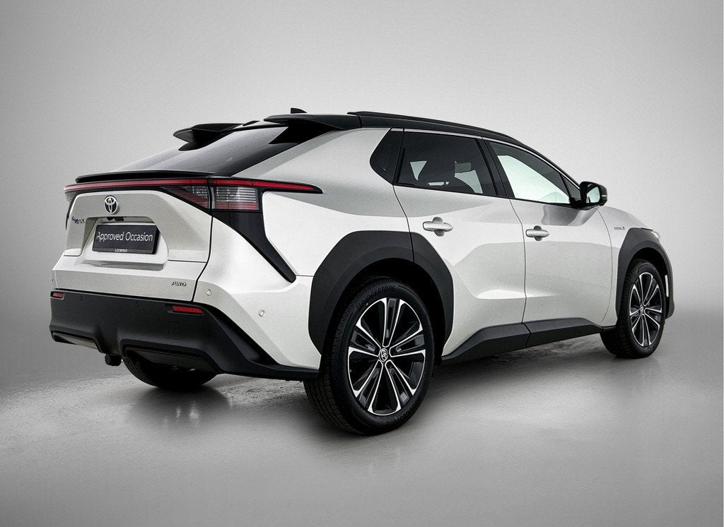Toyota Bz4x Premium 4WD 71 kWh | BTW voertuig | Trekhaak afn, Auto's, Toyota, Automaat, 12 maanden, Stof, Gebruikt