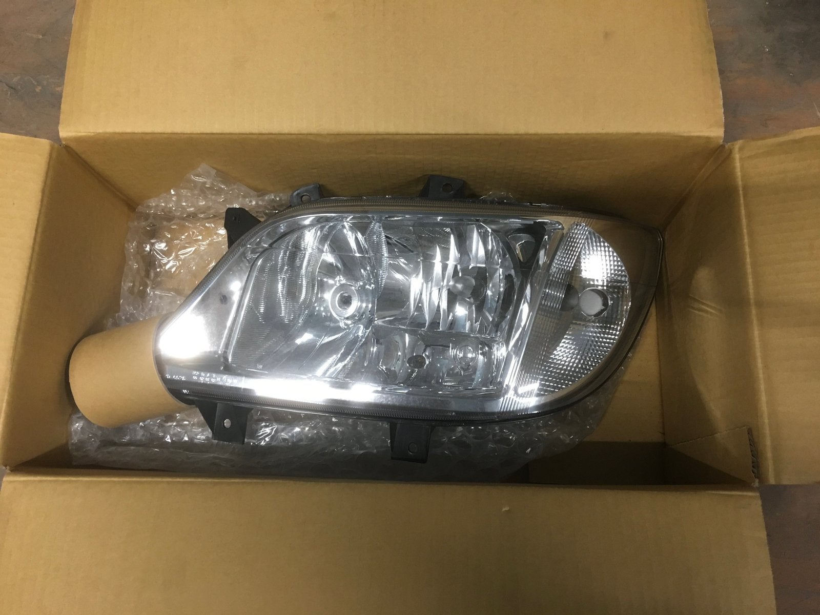 Koplamp Mercedes Sprinter links vanaf 2003 NIEUW, Auto-onderdelen, Verlichting, -, Nieuw, Ophalen of Verzenden, -
