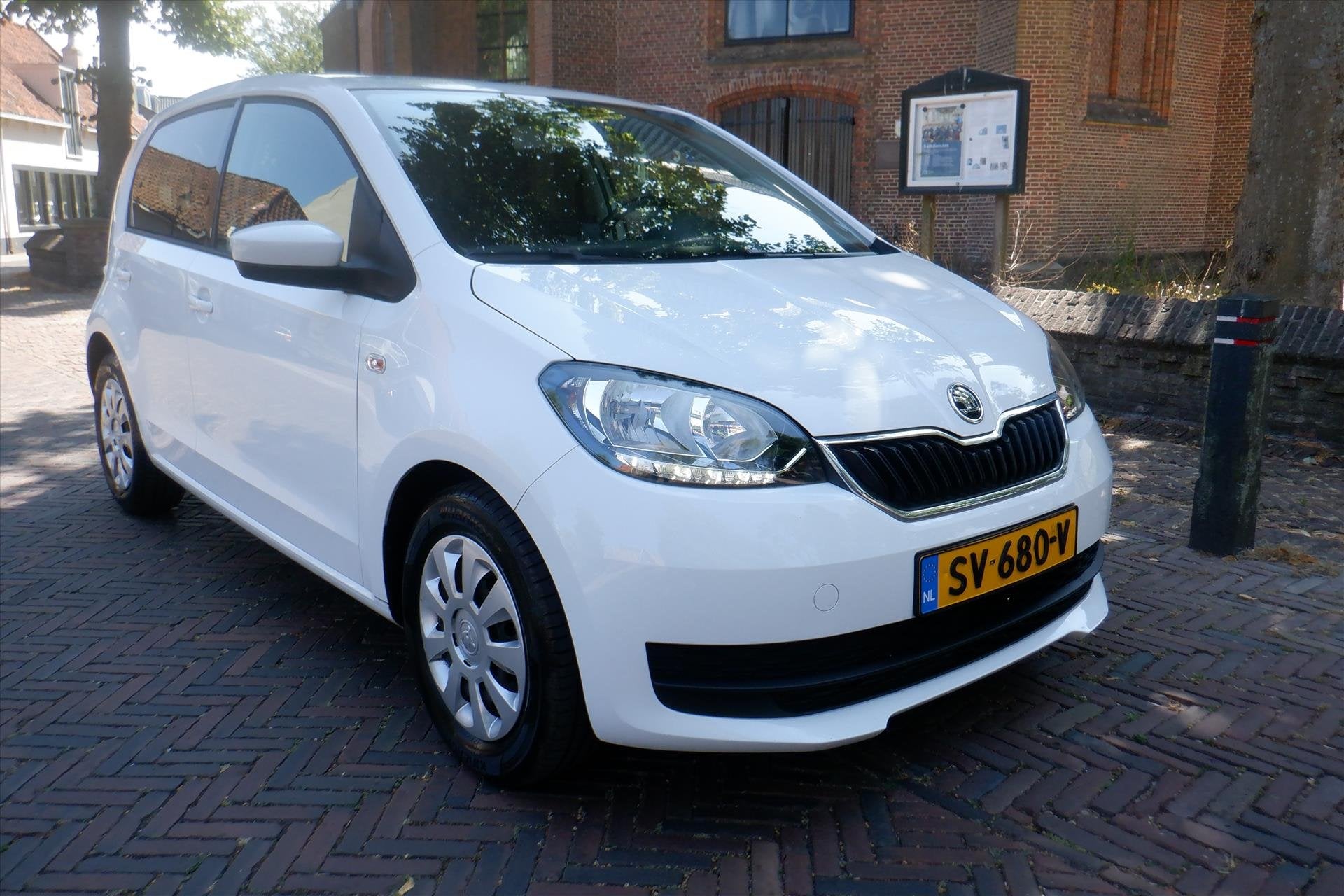 Skoda Citigo 1.0 60pk Greentech Ambition, Auto's, 12 maanden, Stof, Gebruikt, Wit