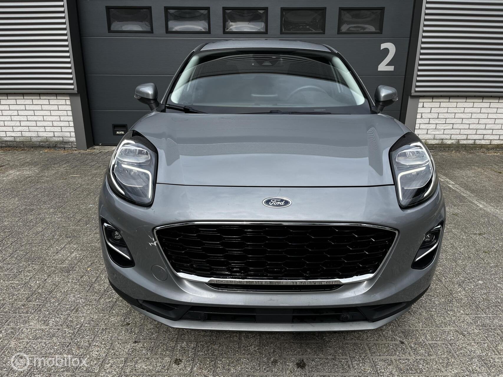 Ford Puma 1.0 EcoBoost CAMERA/CRUISE/NAVI/PDC, Voorwielaandrijving, Zwart, Bedrijf, Automatische klimaatregeling
