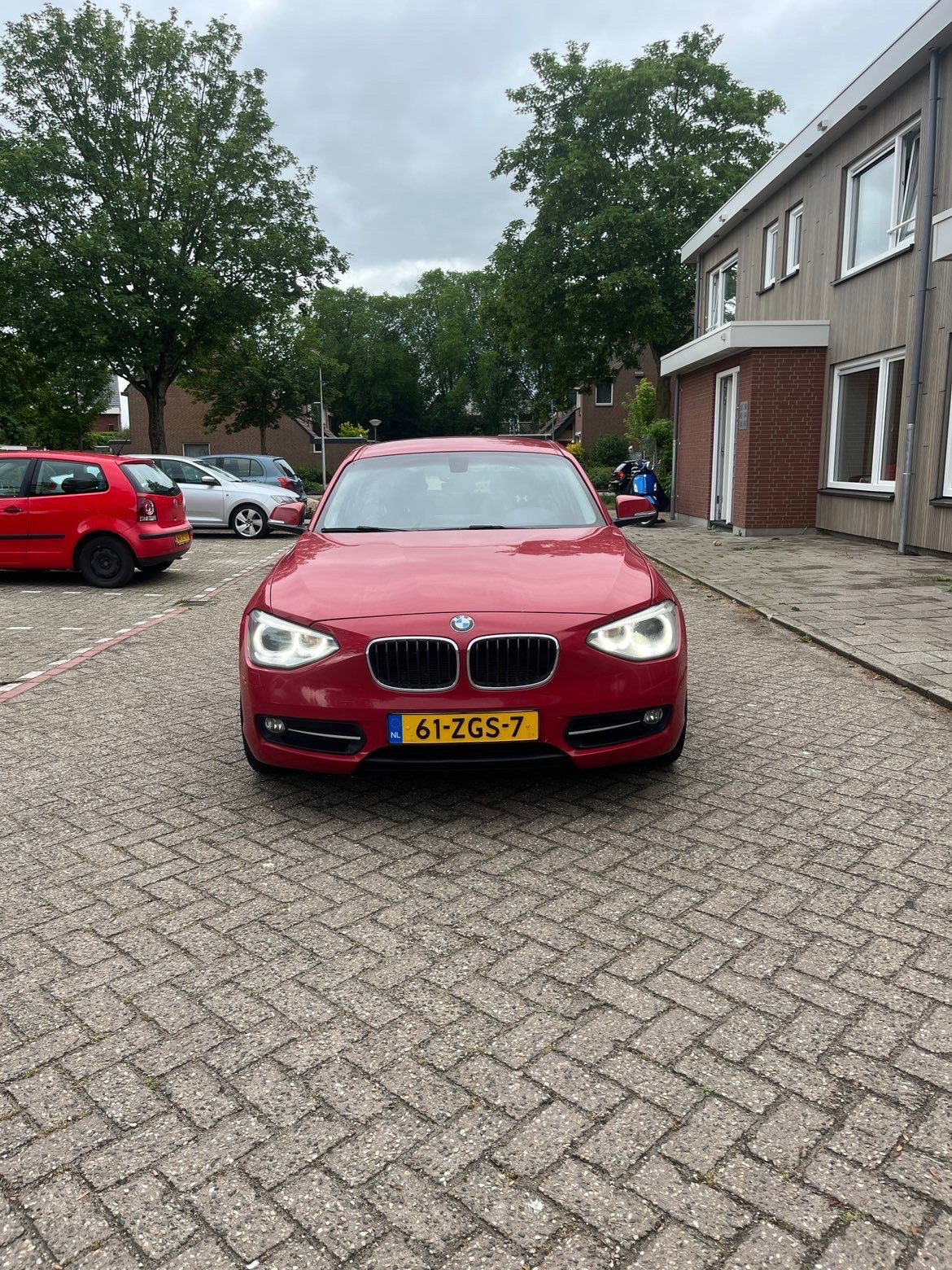 BMW 1-Serie 116I 100KW 5DR 2012 Rood, Auto's, BMW, 1-Serie, 4 cilinders, Origineel Nederlands, 1265 kg