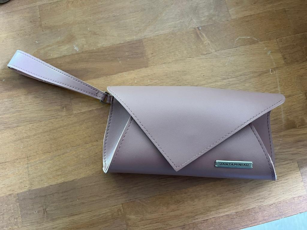 Een oudroze Jan Taminiau clutch (KLM), Sieraden, Tassen en Uiterlijk, Tassen | Damestassen, Ophalen of Verzenden, Nieuw, Overige kleuren