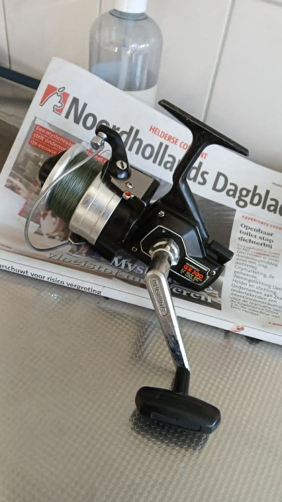 SHIMANO  GX300 ZEEMOLEN  IN GOEDE STAAT ZIE DE FOTO,S, Ophalen of Verzenden, Zo goed als nieuw, Molen