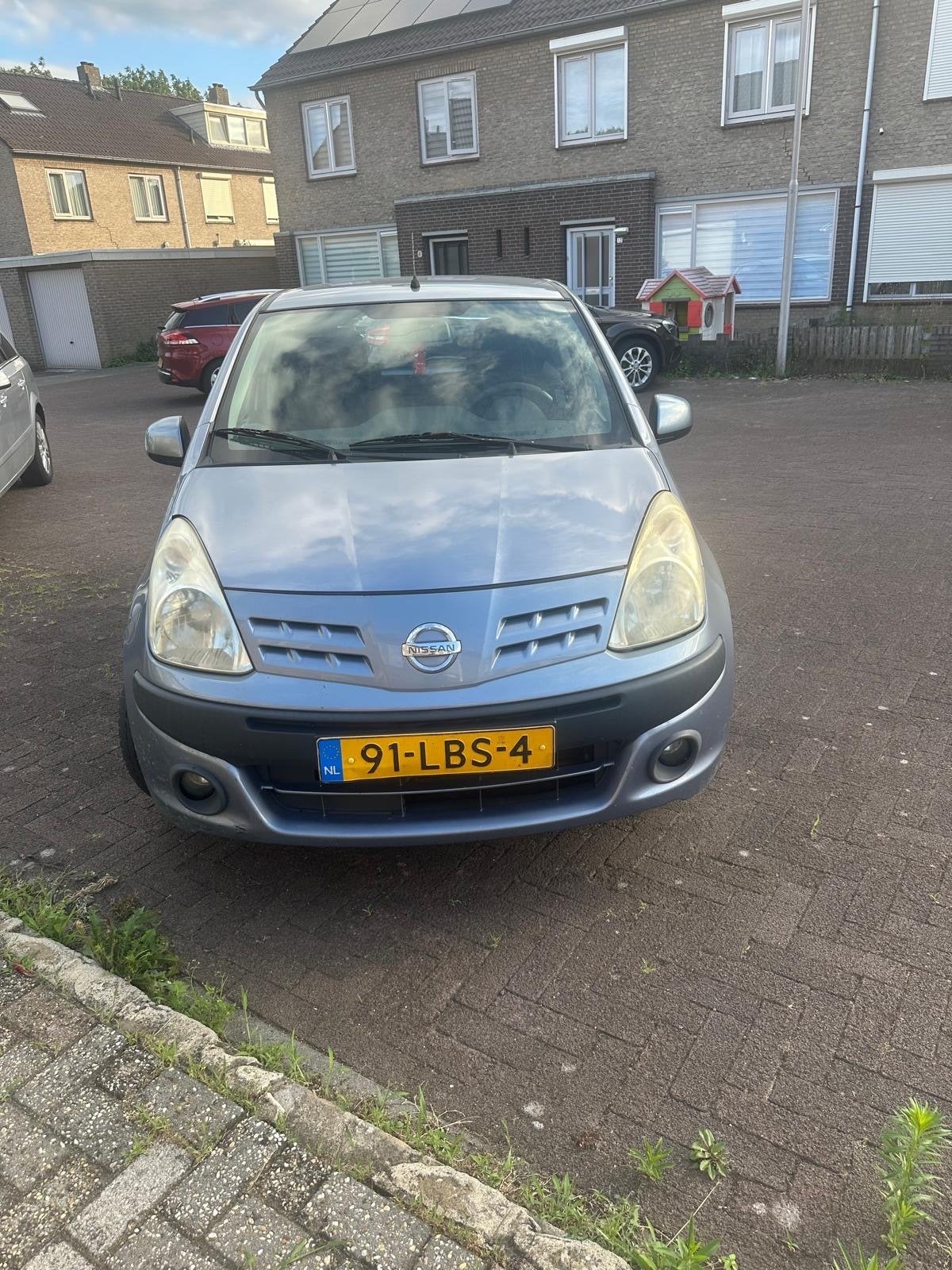 Nissan Pixo 1.0 50KW 5D 2010 Grijs, Auto's, Nissan, Voorwielaandrijving, 200 kg, 4 stoelen, Origineel Nederlands