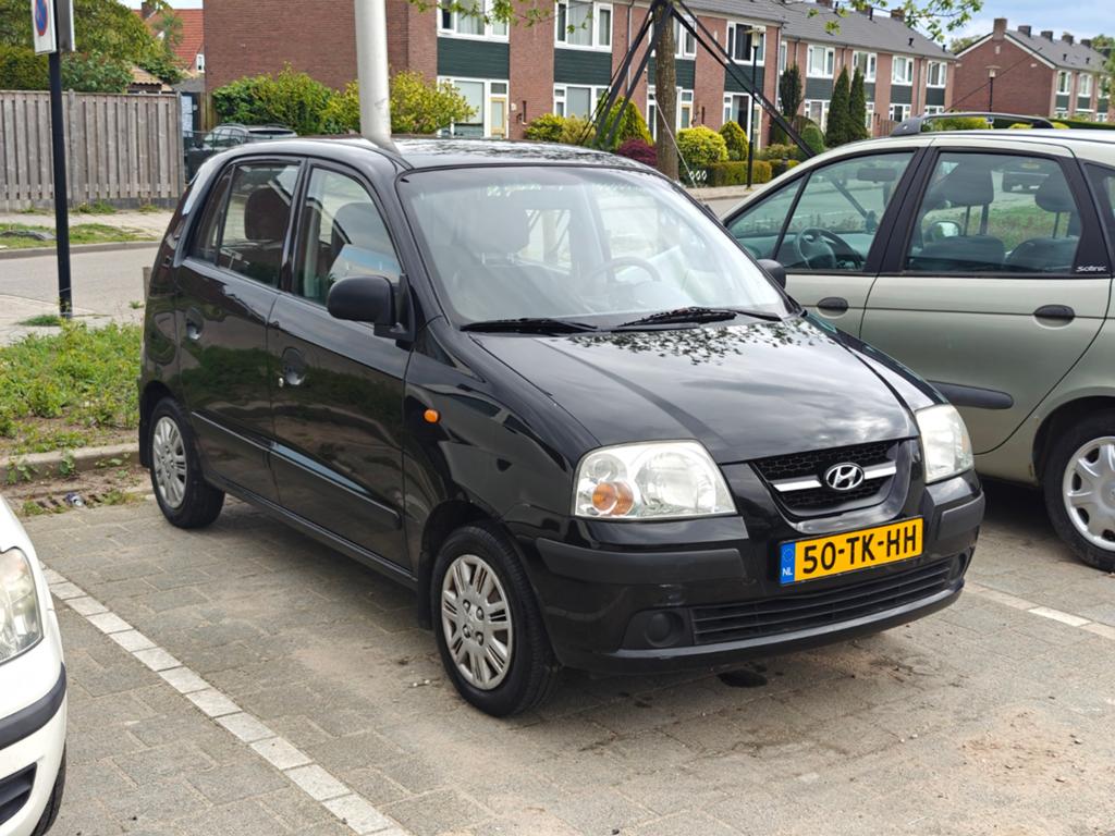 Hyundai Atos 1.1 2006 Zwart, Auto's, Voorwielaandrijving, 31 €/maand, 4 cilinders, Zwart