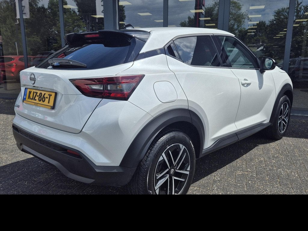 Nissan Juke 1.0 DIG-T N-Connecta | Navigatie | Automaat | Ap, Auto's, Nissan, Stof, Met garantie (alle), Wit, Automatische klimaatregeling