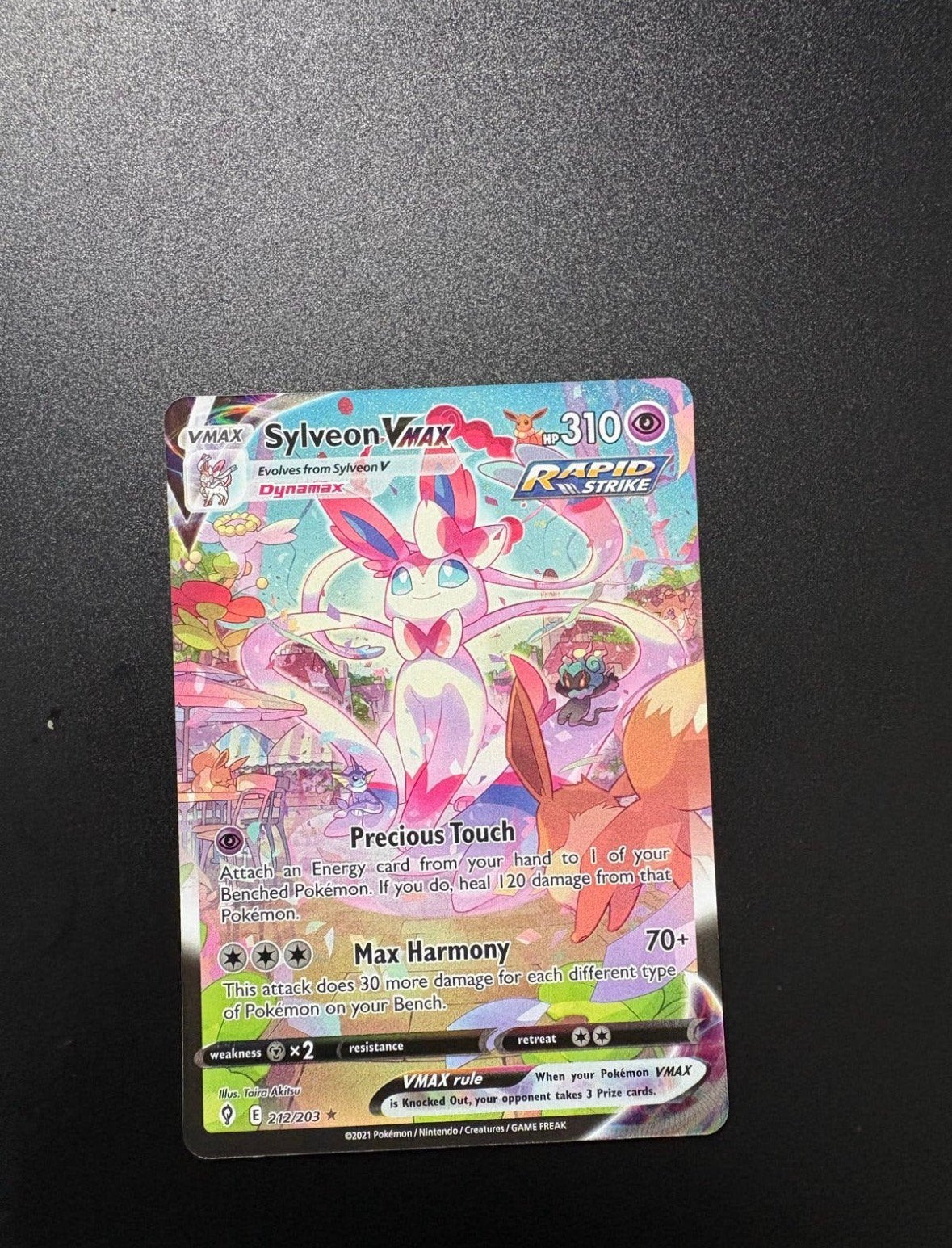 Sylveon VMAX 212/203, Hobby en Vrije tijd, Verzenden, Zo goed als nieuw