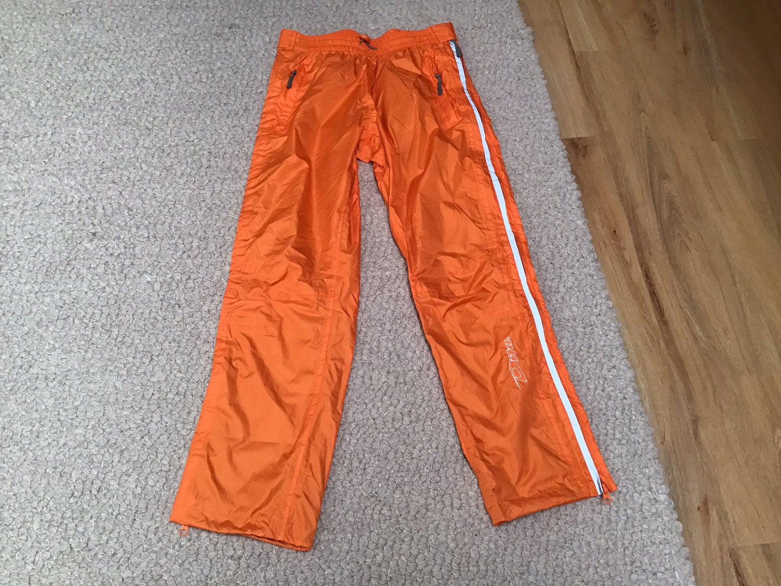 Sportbroek oranje maat 164 van Ditta zgan,reflecterende stre, Ophalen of Verzenden, Zo goed als nieuw, Jongen of Meisje, Broek