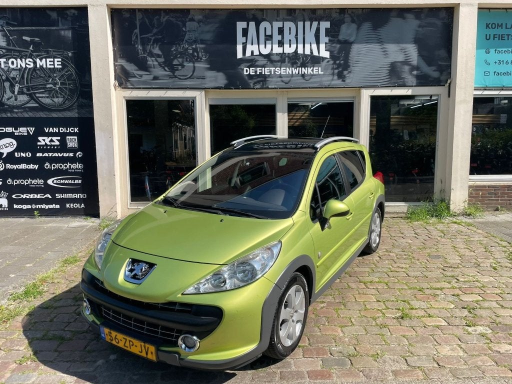 Peugeot 207 1.6 16V SW Outdoor 2008 Geel, Auto's, Peugeot, 4 cilinders, 1110 kg, Handgeschakeld, 600 kg
