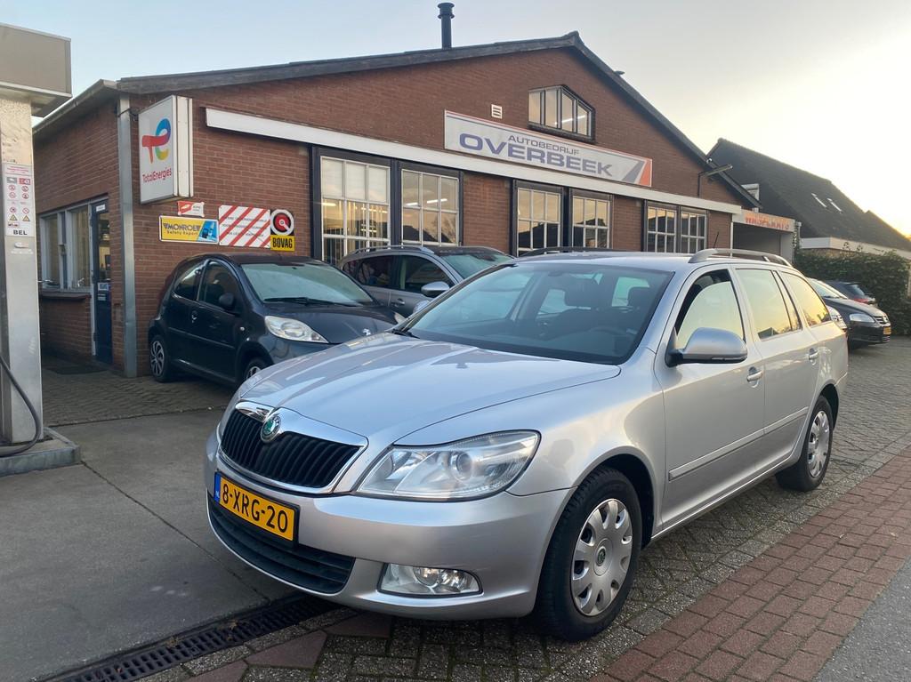 Skoda Octavia Combi 1.6 TDI Ambition, Auto's, Skoda, Euro 5, Stof, Gebruikt, Zwart