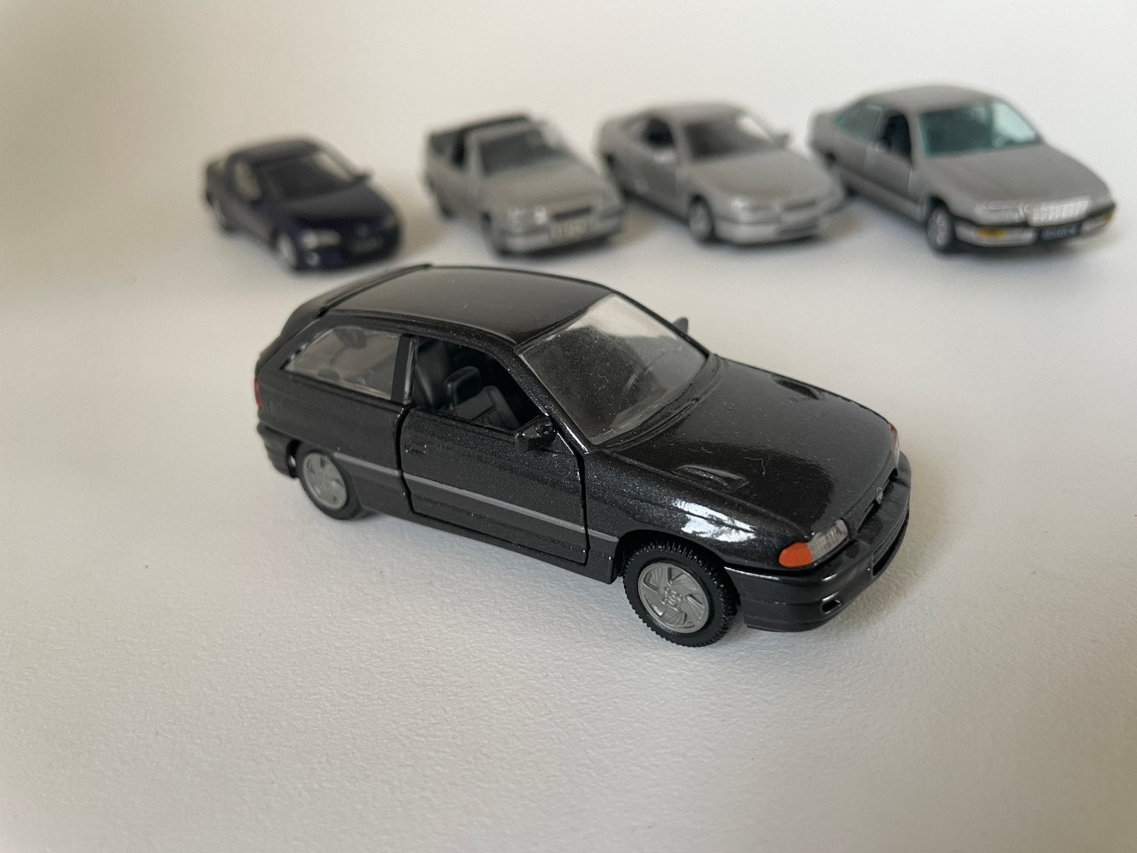 model Opel Astra F 3-d GSi, 1/43 GAMA, donkergrijs antraciet, Ophalen of Verzenden, Gebruikt, Auto, Gama