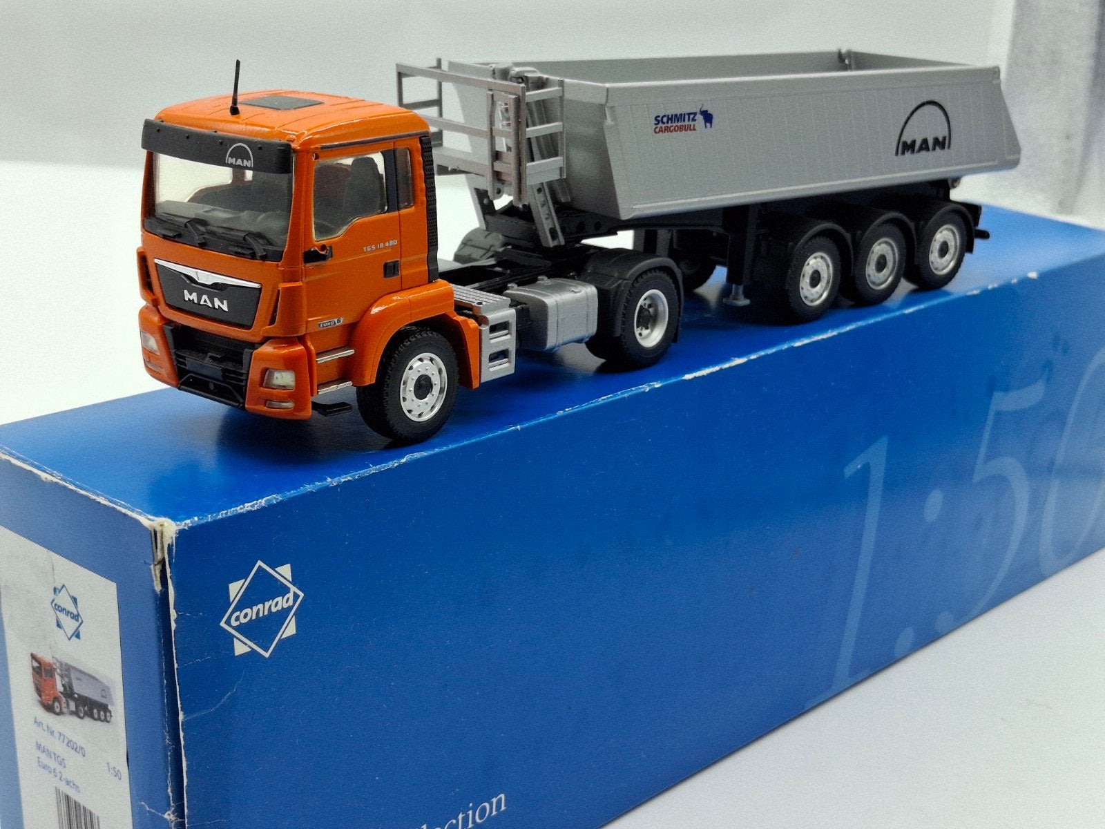 MAN TGS EURO 6 SCHMITZ AKTIE 87.50 €!!, Hobby en Vrije tijd, Ophalen of Verzenden, Zo goed als nieuw, Bus of Vrachtwagen, Conrad