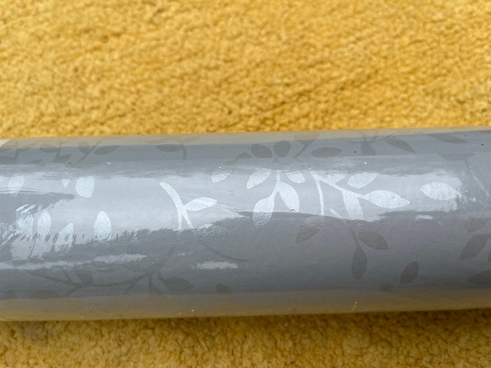Superfresco Easy Flow Grey Behangrol - Zilveren Bladeren, Graham & Brown, Bladeren, Modern, Ophalen of Verzenden