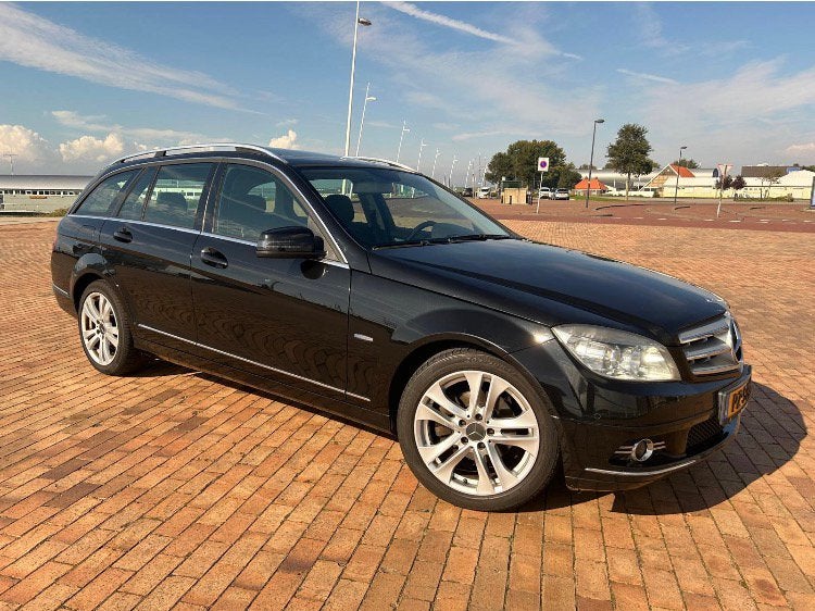 Mercedes-Benz C-Klasse 1.8 C180 CGI Estate AUT 2010 Zwart, Auto's, Mercedes-Benz, Achterwielaandrijving, 1800 kg, Zwart, Zwart