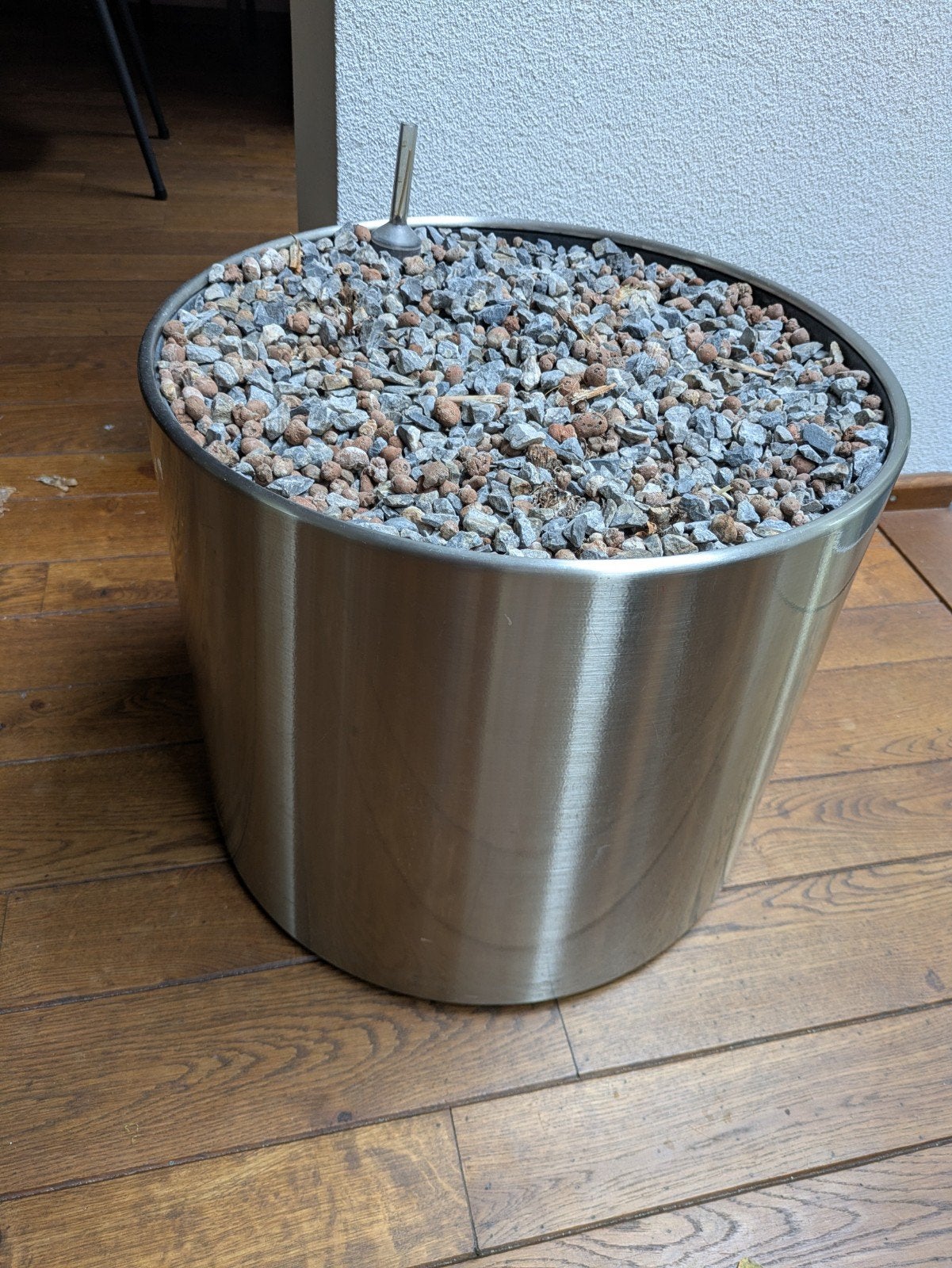 Grote RVS plantenbak / bloempot met wieltjes, Ophalen, 40 cm of meer, Rond, Zo goed als nieuw