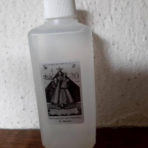 wijwaterflesjes en minikruisjes, Ophalen