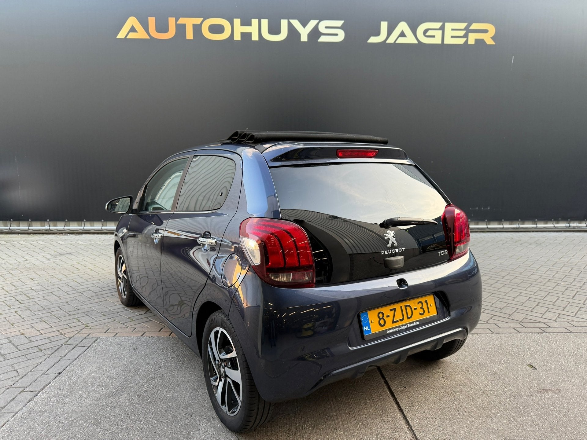 Peugeot 108 1.0 e-VTi Première Top Cabriolet Camera Cruise, Voorwielaandrijving, Stof, Gebruikt, Zwart