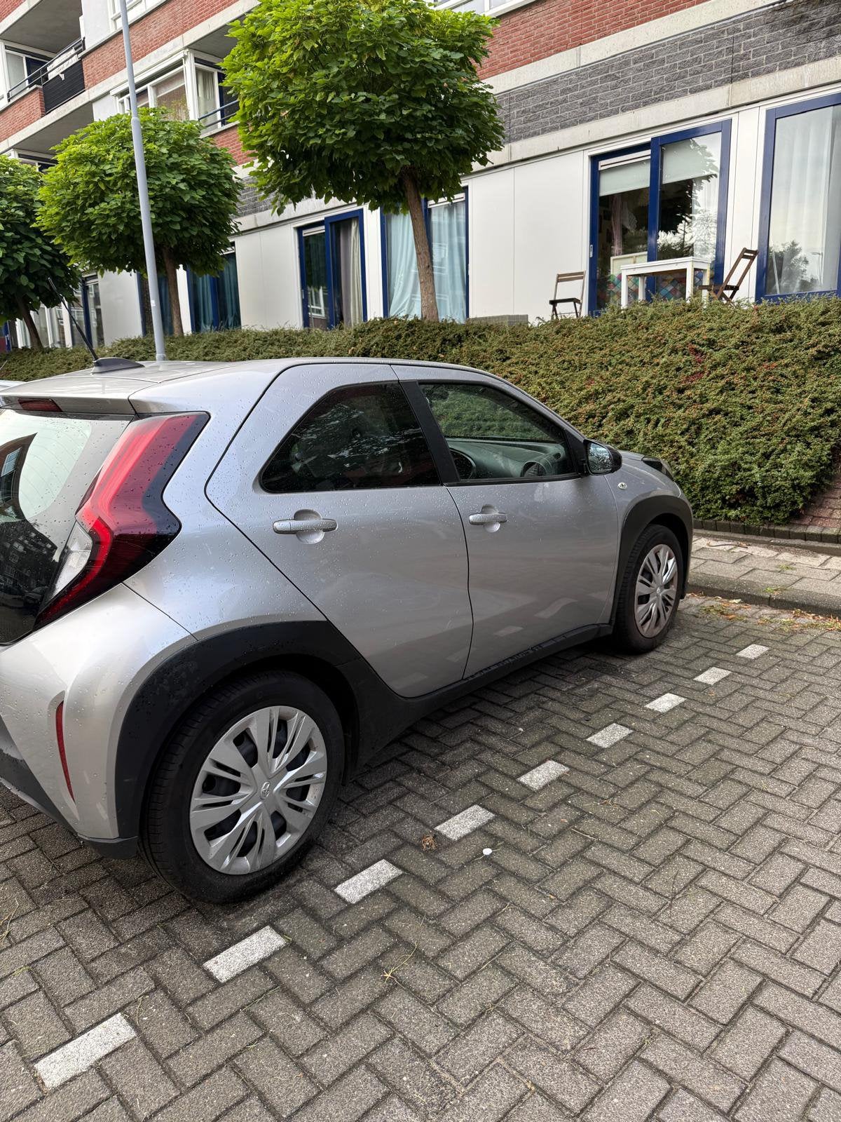 Toyota Aygo X 1.0 Vvt-i MT 72pk 2022 Grijs, Auto's, Toyota, 4 stoelen, Aygo X, Particulier, 3 cilinders