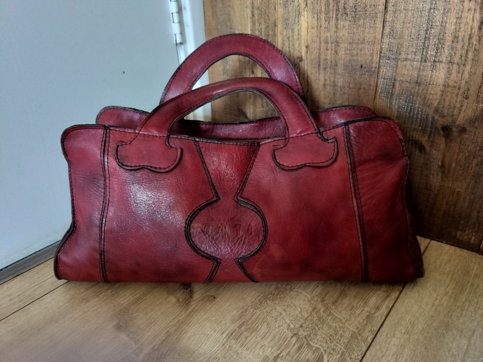Prachtige vintage Italiaanse leren tas jaren 70 merk Cati

E, Verzenden, Zo goed als nieuw, Rood