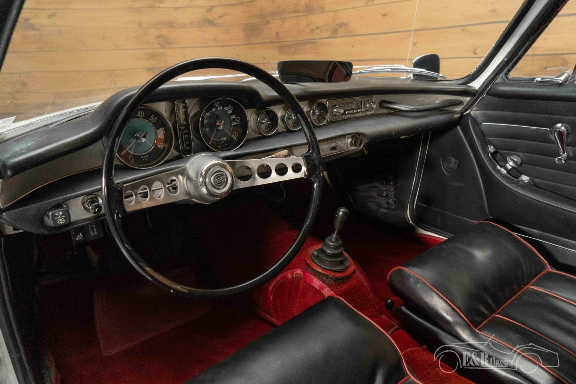 Volvo P1800 S | Gerestaureerd | Historie bekend | 1965, Auto's, Achterwielaandrijving, Zwart, 95 pk, 4 stoelen